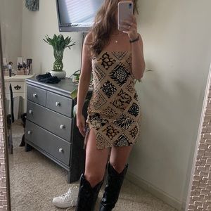 Mini dress with slit and adjustable straps